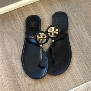 Tory Burch Black Slides with Gold Emblem